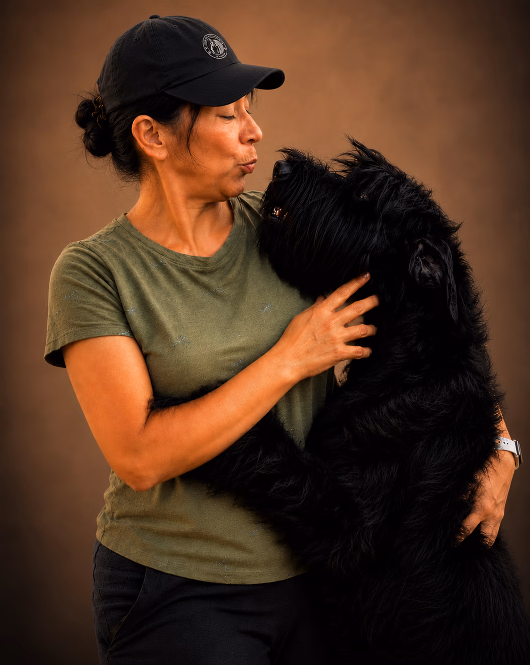 tender embrace with furry giant schnauzer